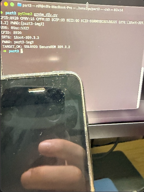 A real iPhone 3GS with a black DFU screen in front of the terminal showing the PWND marker